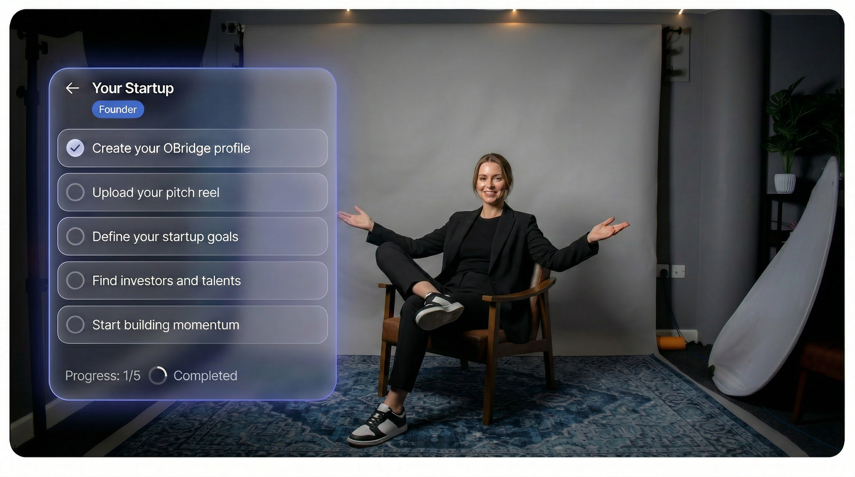 A founder seated in a studio beside an OBridge startup setup checklist